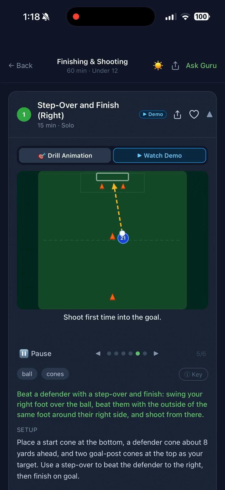 An animated drill in progress inside the SoccerCoachGuru app, showing a shot arrow toward goal